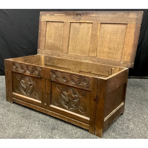 868 - A Charles II oak three panel blanket chest, of small proportions, hinged top, carved front, 45cm hig... 