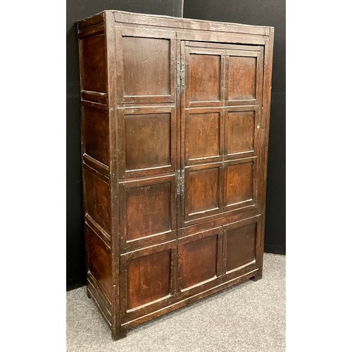 866 - A Charles II oak panelled cupboard /provision cupboard. Six-panelled single door, and sides, stile f... 