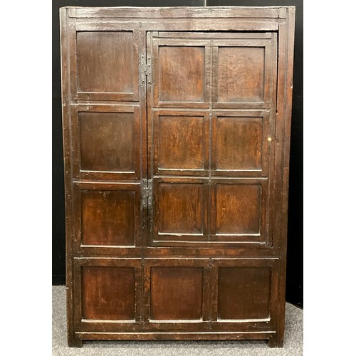 866 - A Charles II oak panelled cupboard /provision cupboard. Six-panelled single door, and sides, stile f... 