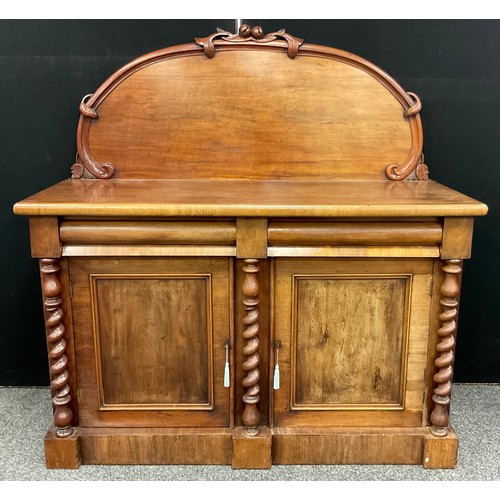 899 - A Victorian mahogany mahogany side cabinet, arched back with carved fruiting scroll cresting, the pr... 