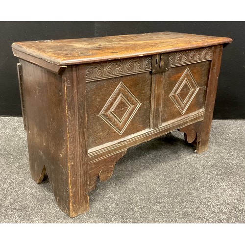 912 - A small 18th century oak blanket chest, carved two-panel front, stile feet, 46cm high x 87cm x 37.5c... 