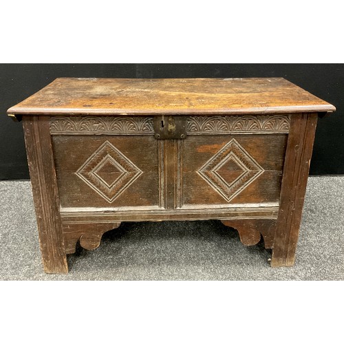 912 - A small 18th century oak blanket chest, carved two-panel front, stile feet, 46cm high x 87cm x 37.5c... 