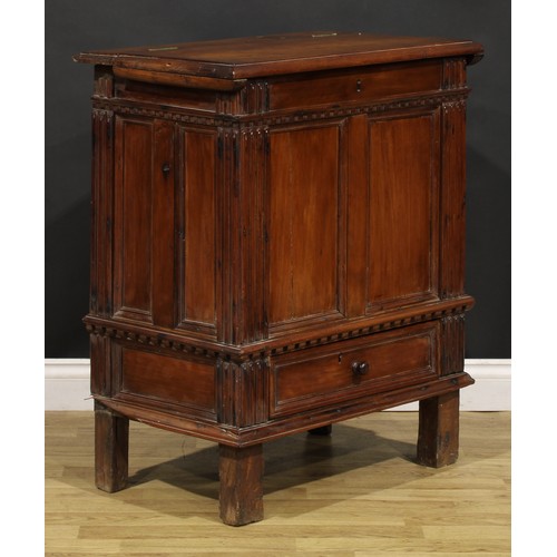 871 - An 18th century Continental cherry vestment chest, hinged top enclosing a pair of compartments, draw... 