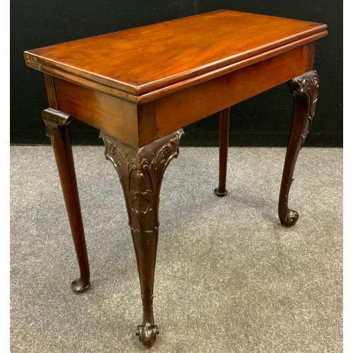 1040 - A George II Cuban mahogany games table, baize lined fold over top,  72.5cm high x 77.5cm wide x 39.5... 