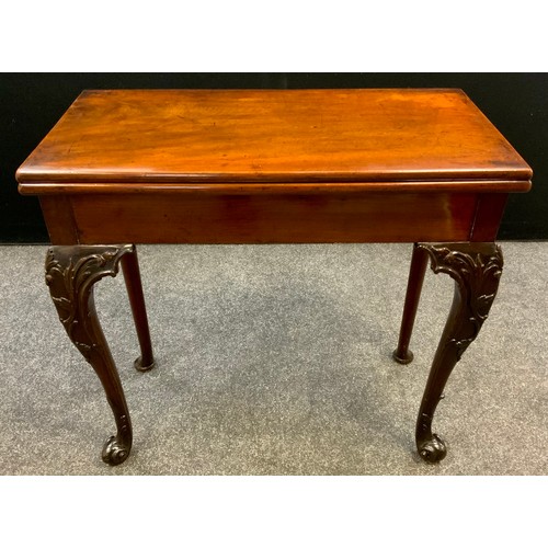 1040 - A George II Cuban mahogany games table, baize lined fold over top,  72.5cm high x 77.5cm wide x 39.5... 