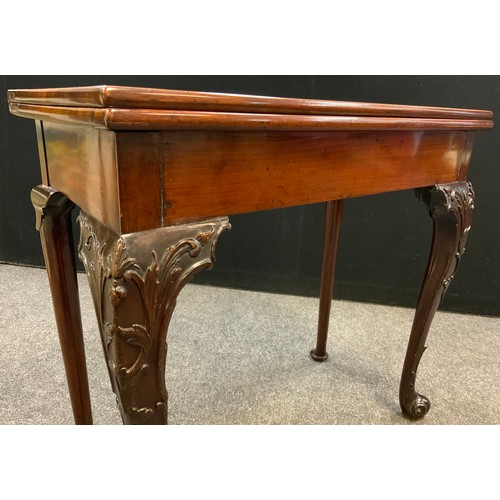 1040 - A George II Cuban mahogany games table, baize lined fold over top,  72.5cm high x 77.5cm wide x 39.5... 