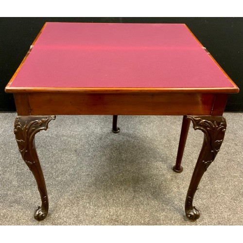 1040 - A George II Cuban mahogany games table, baize lined fold over top,  72.5cm high x 77.5cm wide x 39.5... 