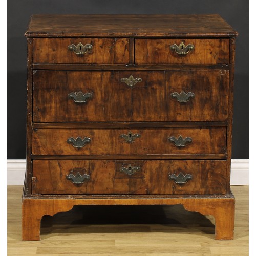 1038 - A George I walnut chest, moulded crossbanded top above two short and three long drawers, engraved br... 