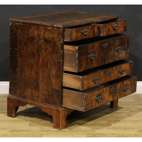 1038 - A George I walnut chest, moulded crossbanded top above two short and three long drawers, engraved br... 