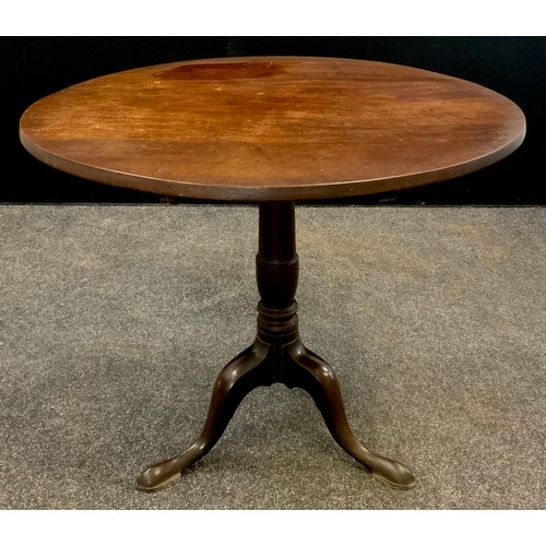 1118 - A George III mahogany tripod table, circular tilt-top, turned pedestal support, 70.5cm high x 80cm d... 