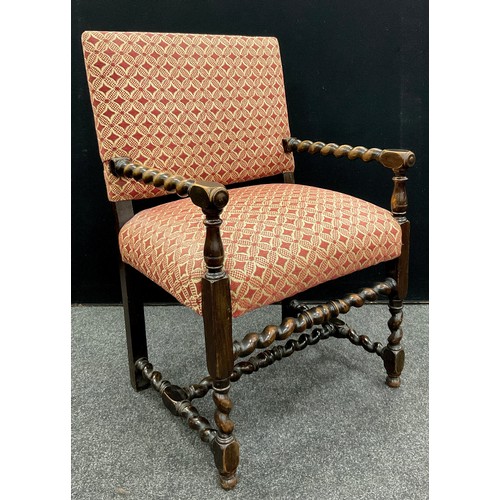 1265 - A Victorian walnut elbow chair, upholstered back and sprung seat, with barley-twist turned arms, str... 