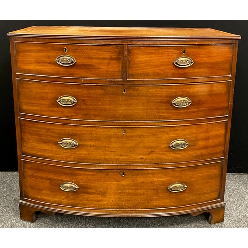 1043 - A George III mahogany bow-front chest of drawers, the satinwood cross-banded top with reeded edge, a... 