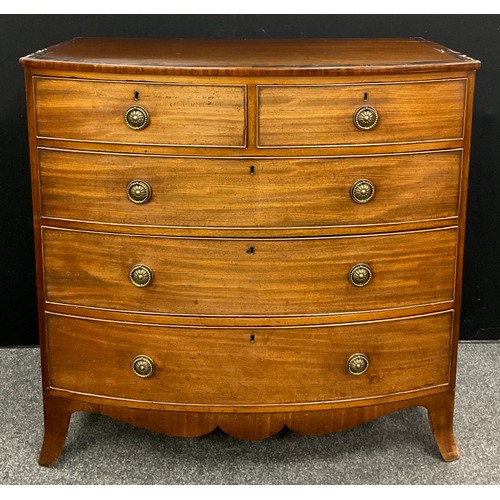 1042 - A George III mahogany bow-front cheats of two short, over three graduated long drawers, shaped apron... 