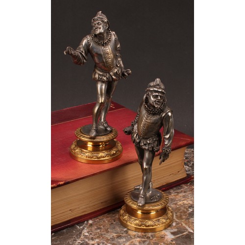 1252 - Continental school, 19th century, a pair of silvered and gilt bronze figures of the court, standing ... 