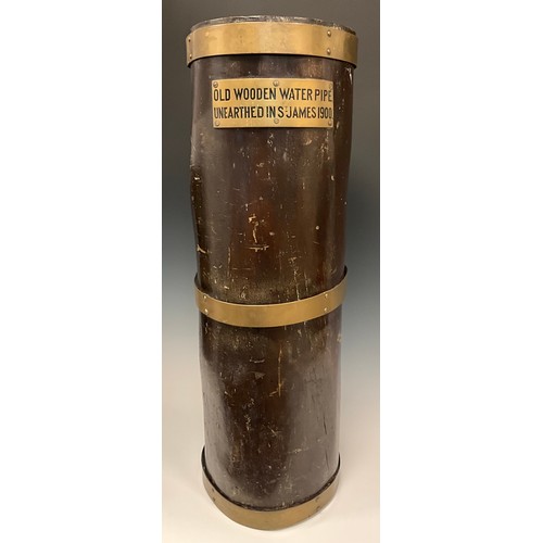 1255 - London History - a brass mounted section of post-medieval water pipe, applied with a plaque inscribe... 