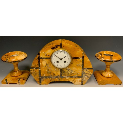 985 - A French Art Deco Siena and black marble clock garniture, arched clock case, white dial, Arabic nume... 