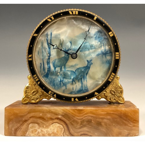 998 - An Art Deco miniature desk clock, the dial printed in blue with Stag and Deer mountainous landscape,... 