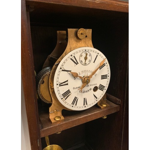 992 - A late 19th/early 20th century mahogany J & J Braddock mantel clock, Globe Meter Works, Oldham, whit... 