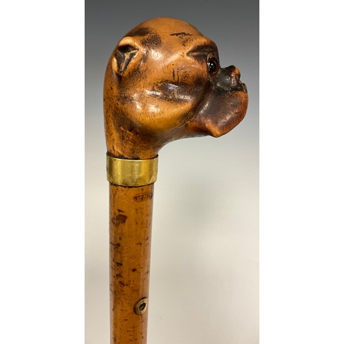 686 - A carved Dogs head handled walking stick, as a Pugs head, inset glass eyes, 18ct gold plated ferule,... 