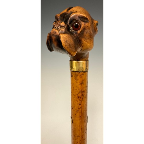 686 - A carved Dogs head handled walking stick, as a Pugs head, inset glass eyes, 18ct gold plated ferule,... 