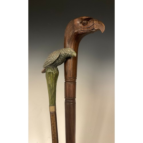 697 - An interesting late 19th / early 20th century walking stick, the handle carved and painted as a styl... 