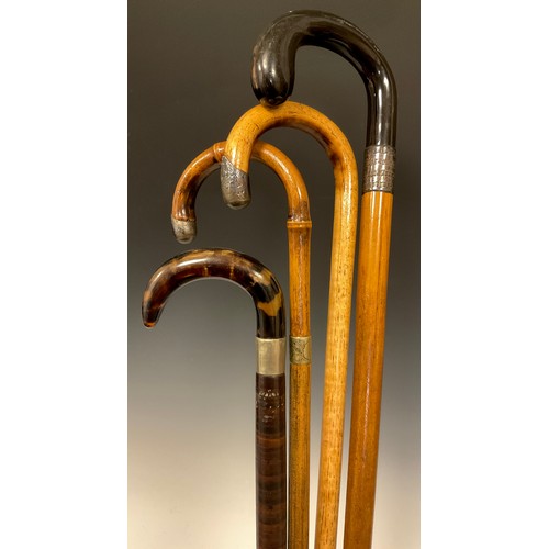 698 - A Victorian walking stick with tortoiseshell handle and gently tapered shaft composed of multiple di... 