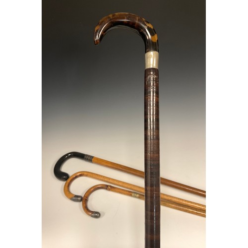 698 - A Victorian walking stick with tortoiseshell handle and gently tapered shaft composed of multiple di... 