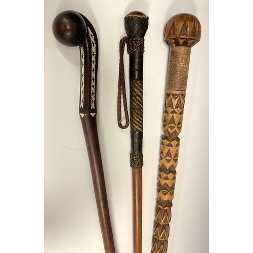 701 - A carved African knobkerrie stick or Hottentot Kerri stick, inlaid to the handle with mother-of-pear... 