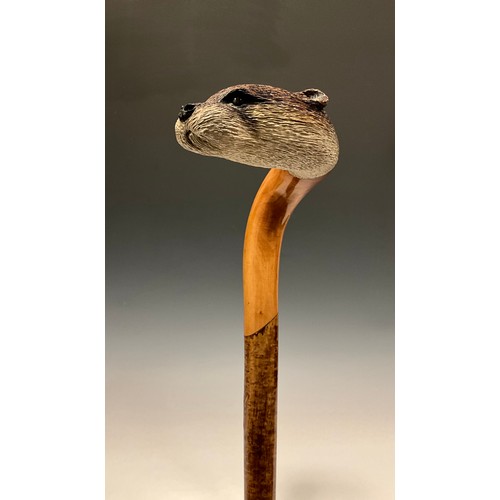 704 - A 20th century carved wooden walking stick, by Colin Christian, the handle realistically carved and ... 