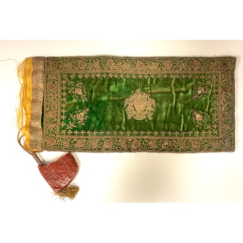 1125 - A 19th century beadwork  and green velvet scroll case or bag, with silver wire armorial and floral b... 