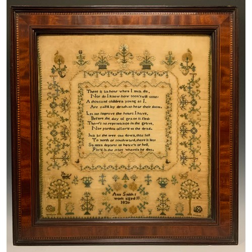 1129 - A George III/IV sampler worked by Ann Smiths, age 11, dated 1820, the centre with poem 

