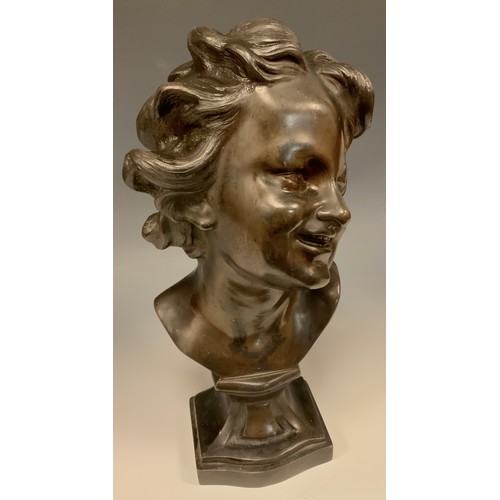 877 - A 19th century Bronze Bust as a Smiling Young Lady, integral socle, 29.5cm high.