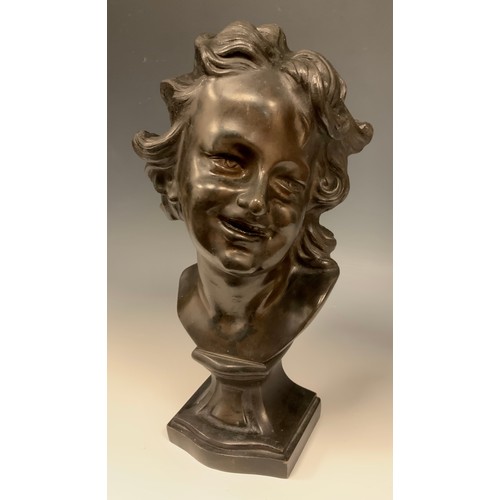 877 - A 19th century Bronze Bust as a Smiling Young Lady, integral socle, 29.5cm high.