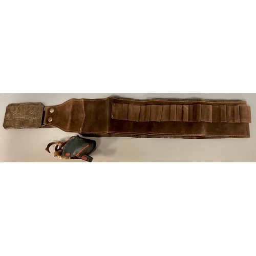 902 - An Underberg leather shotgun cartridge belt, 20 shot capacity, metal buckle, 111cm long;  A Falconry... 