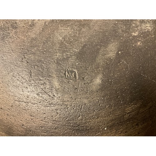 322 - Jason Wason (b.1946) a studio pottery dished ovoid bowl, relief moulded with tribal motifs, 39.5cm w... 