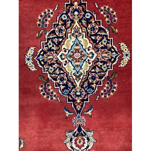 1081 - A Central Persian Kashan carpet, hand-knotted with an intricate diamond-shaped medallion to centre, ... 