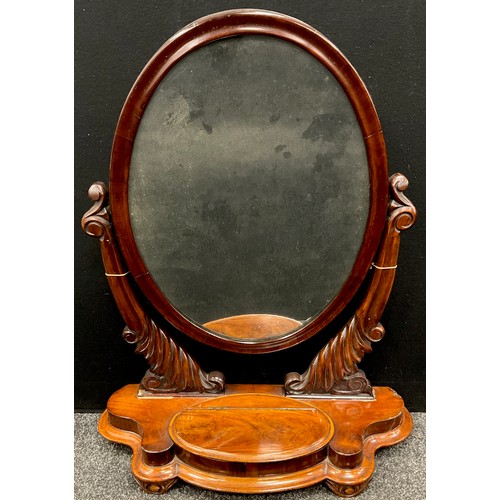 1037 - A Victorian mahogany dressing table mirror, the oval mirror cradled on carved supports, on a serpent... 