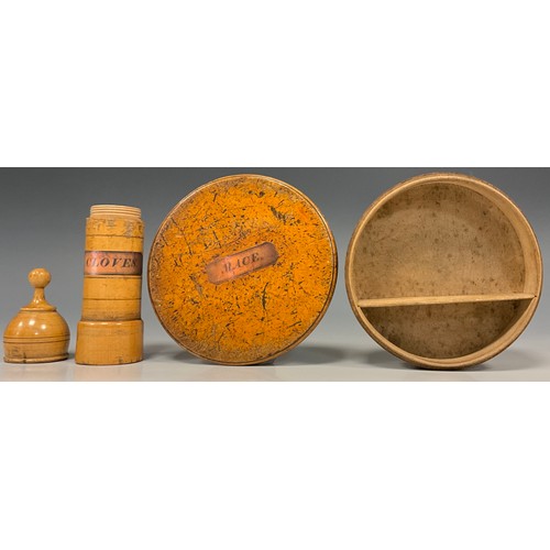 1142 - A 19th century treen spice box, of circular form with internal section divider, ladled Mace3.9cm dee... 