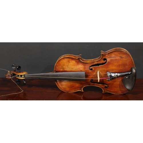 1077 - A violin, the two-piece maple back 35.5cm long excluding button, paper label printed Copy of Gio Pao... 