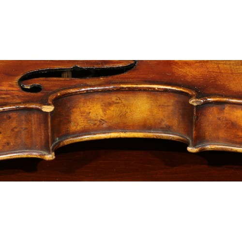 1077 - A violin, the two-piece maple back 35.5cm long excluding button, paper label printed Copy of Gio Pao... 