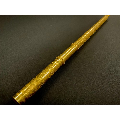 1075 - A Victorian Elkington & Co engraved and cast gilt metal conductors baton, floral scrolled body, flan... 