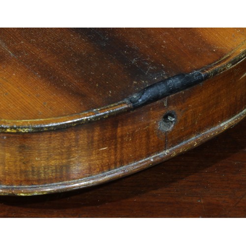 1076 - A violin, the two-piece back 36cm long excluding button, rosewood tuning pegs, outlined throughout w... 