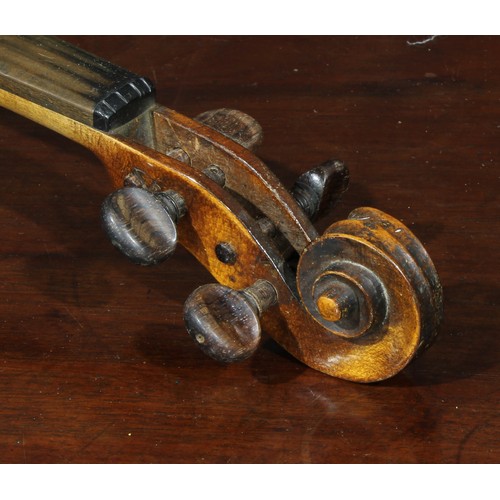 1076 - A violin, the two-piece back 36cm long excluding button, rosewood tuning pegs, outlined throughout w... 