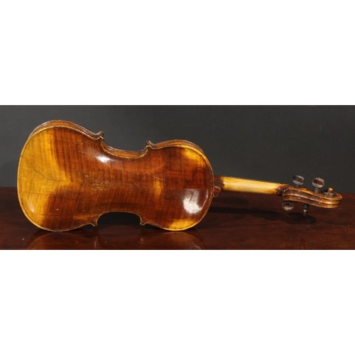 1076 - A violin, the two-piece back 36cm long excluding button, rosewood tuning pegs, outlined throughout w... 