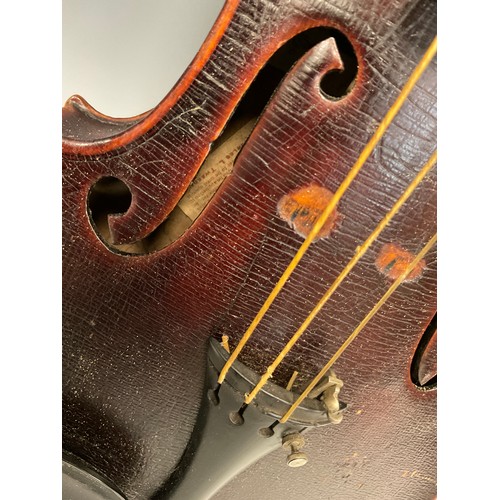 1070 - An early 20th century Violin, by Charles L Tweedale, well-figured two-piece back, length of back 36c... 