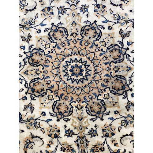 1091 - A Central Persian Kashan carpet, hand-knotted with eight-lobed lotus-form medallion, within an intri... 