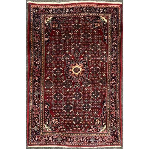 1089 - A North-west Persian Bidjar rug, 185cm x 120cm.