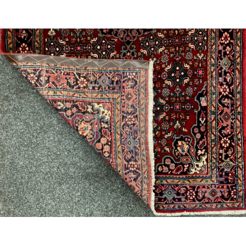 1089 - A North-west Persian Bidjar rug, 185cm x 120cm.