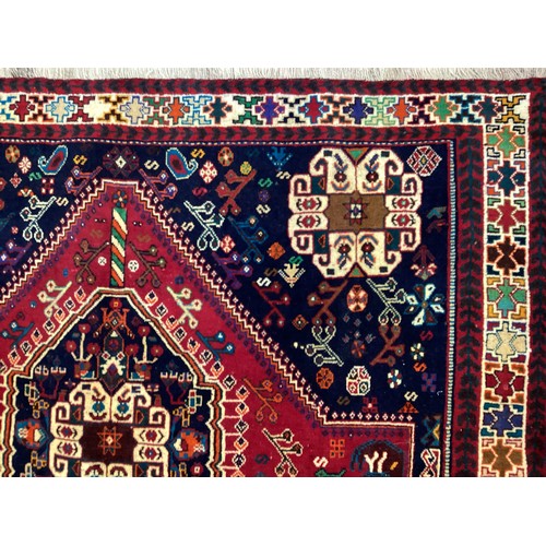 1094 - A South-west Persian Qashgai carpet, hand-knotted, 260cm x 180cm.