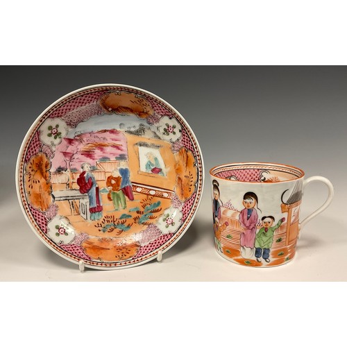 329 - A New Hall cup and saucer, the saucer ‘Boy in the Window’ pattern 425, similar coffee can, c.1800.